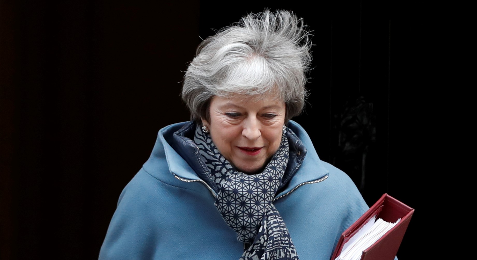 UPDATE 1-UK PM May will seek "pragmatic" solution to Brexit deal in Brussels