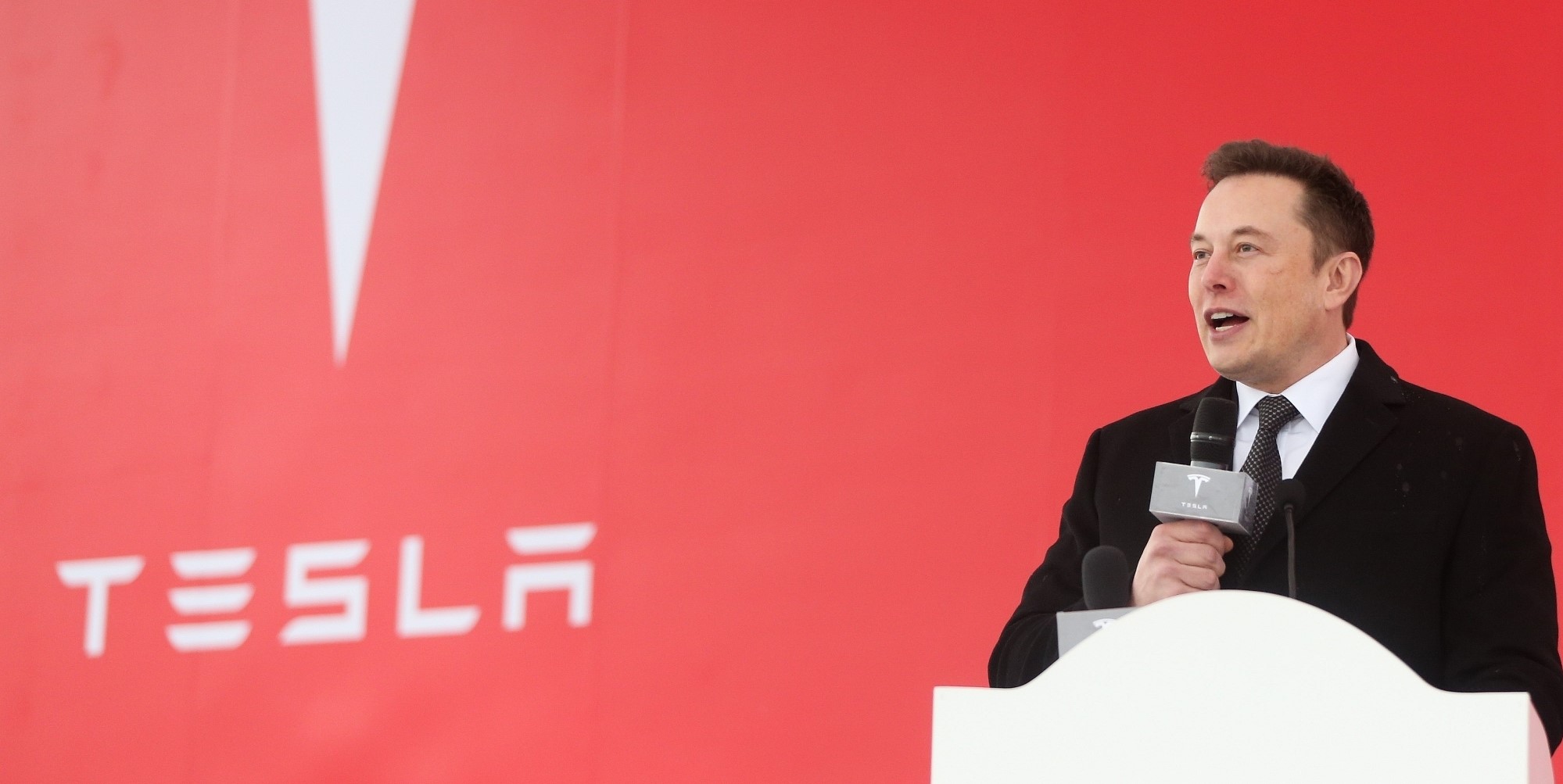 UPDATE 3-Musk dance moves launch Tesla SUV programme at new China factory